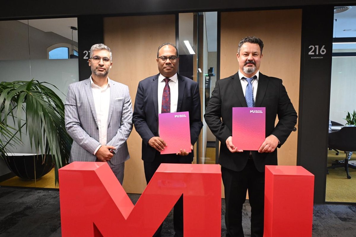 BARZ and Murdoch University Dubai representatives with the Murdoch University mark